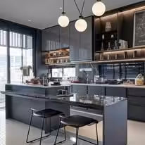 Charcoal kitchen with brass pendants, open shelving and a breakfast bar